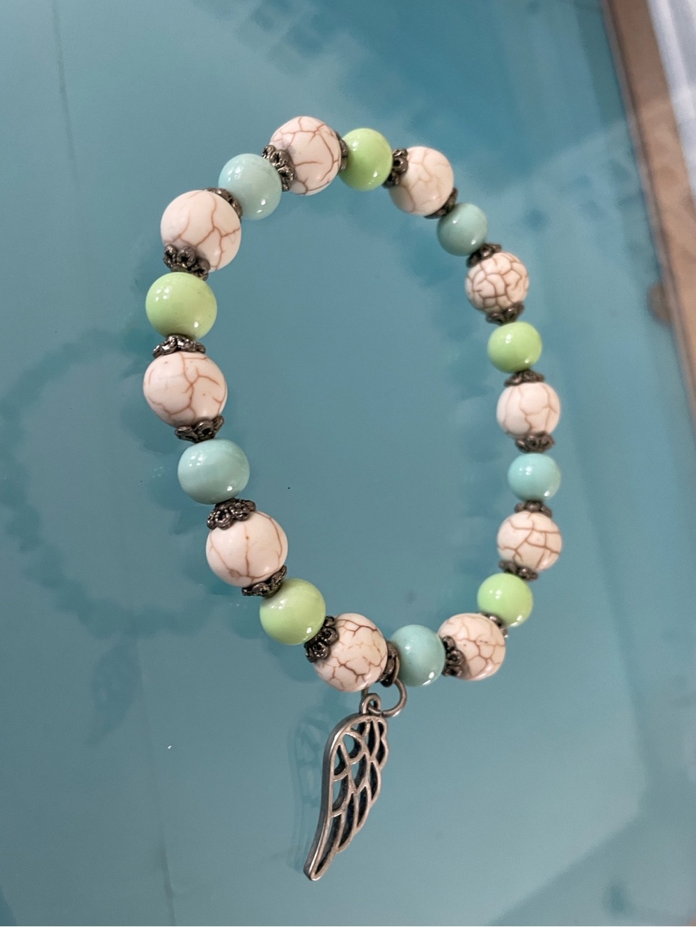 Turquoise, Lime & Cream Beaded Stretch Bracelet with Angel Wing Charm
